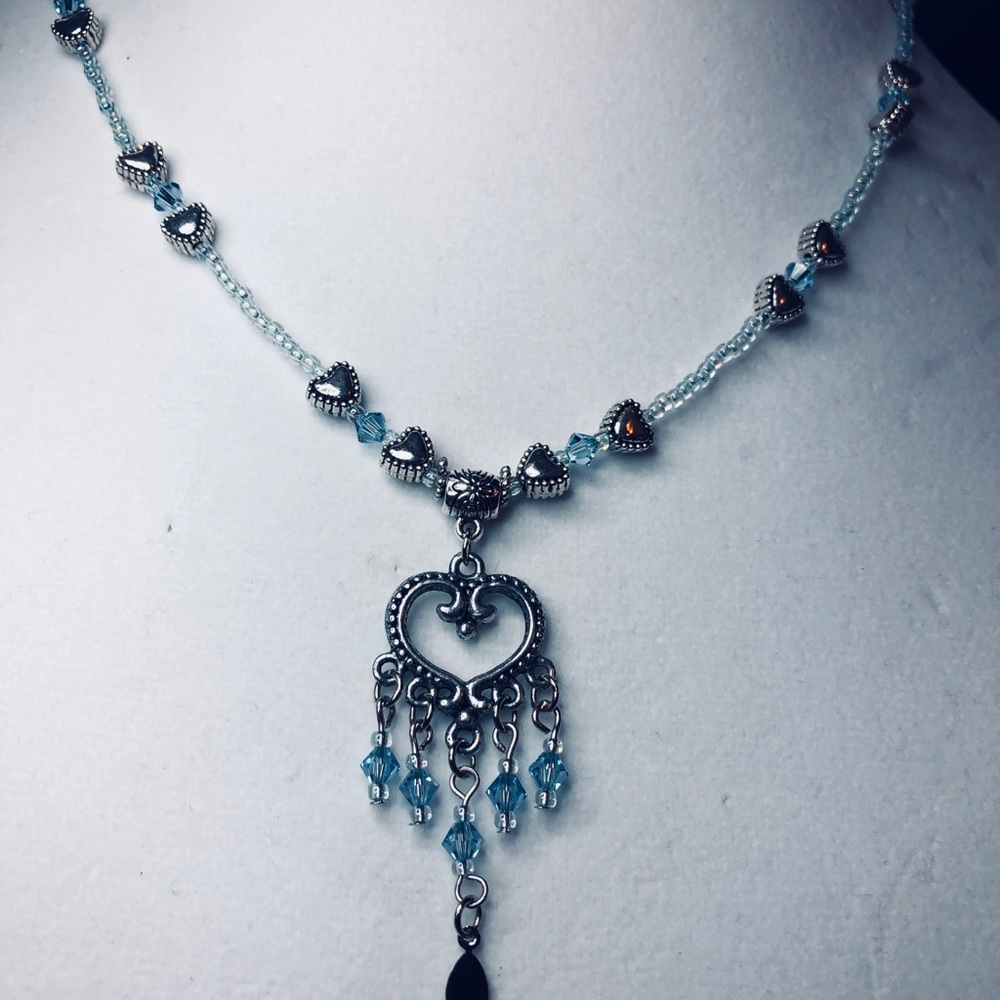 Open heart blue crystal necklace.